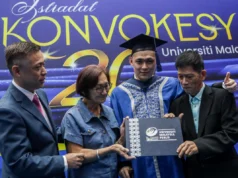 Pegawai tentera mengatasi kanser tulang untuk menamatkan ijazah sarjana.