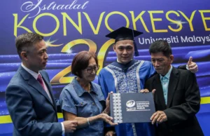 Pegawai tentera mengatasi kanser tulang untuk menamatkan ijazah sarjana.